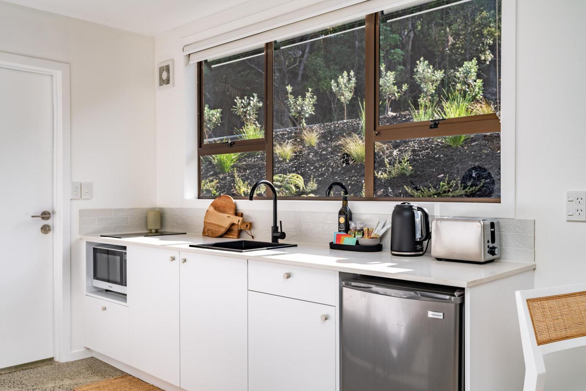 מנגאוואי Tui & Nikau Cabins חדר תמונה